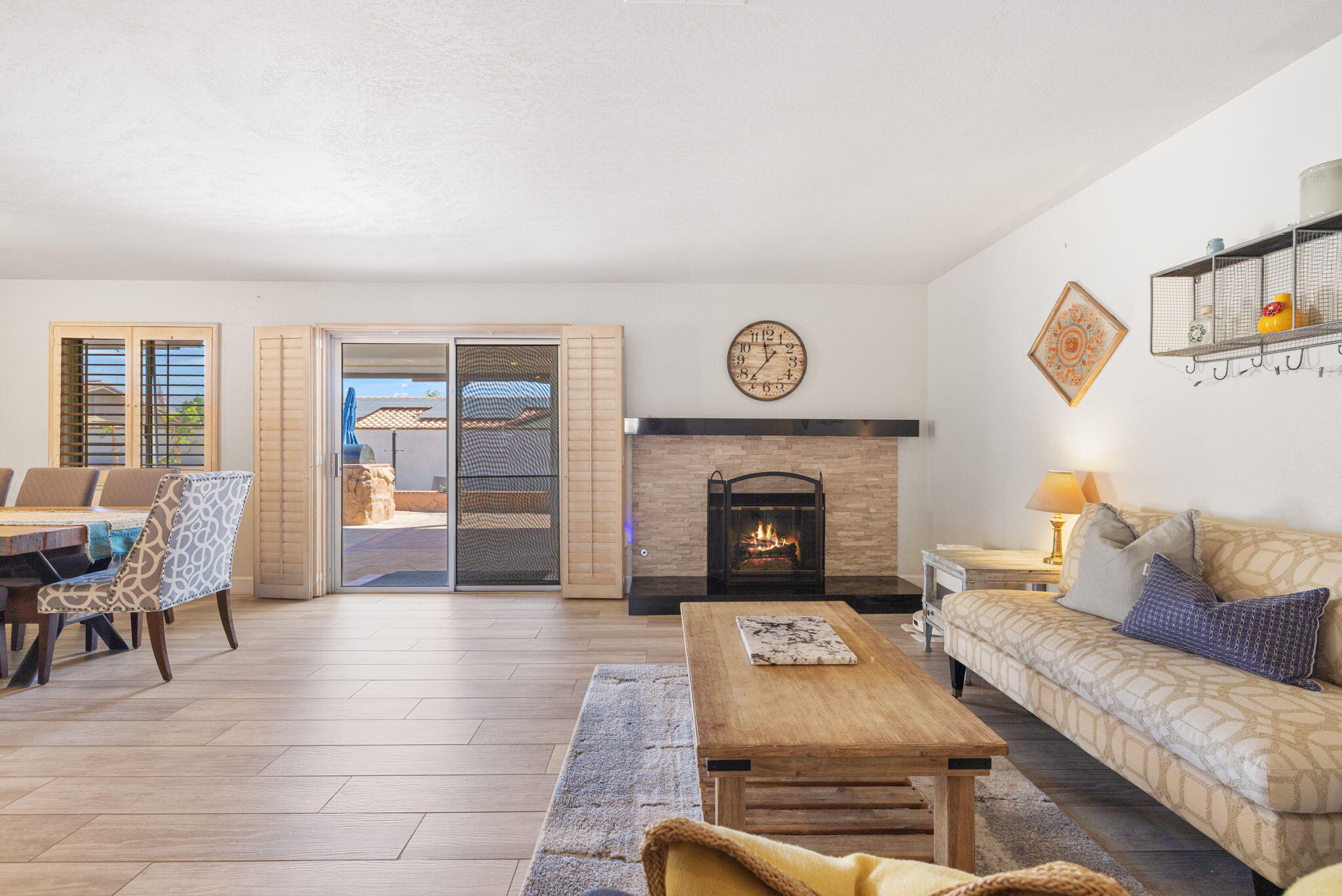 42230 May Pen Road Bermuda Dunes, CA 92203 - Photo 20 of 57 a living room with furniture and a fireplace