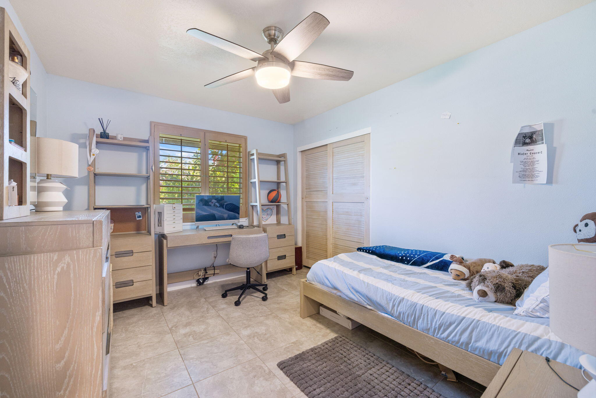 42230 May Pen Road Bermuda Dunes, CA 92203 - Photo 27 of 57 a bedroom with a bed and a chandelier