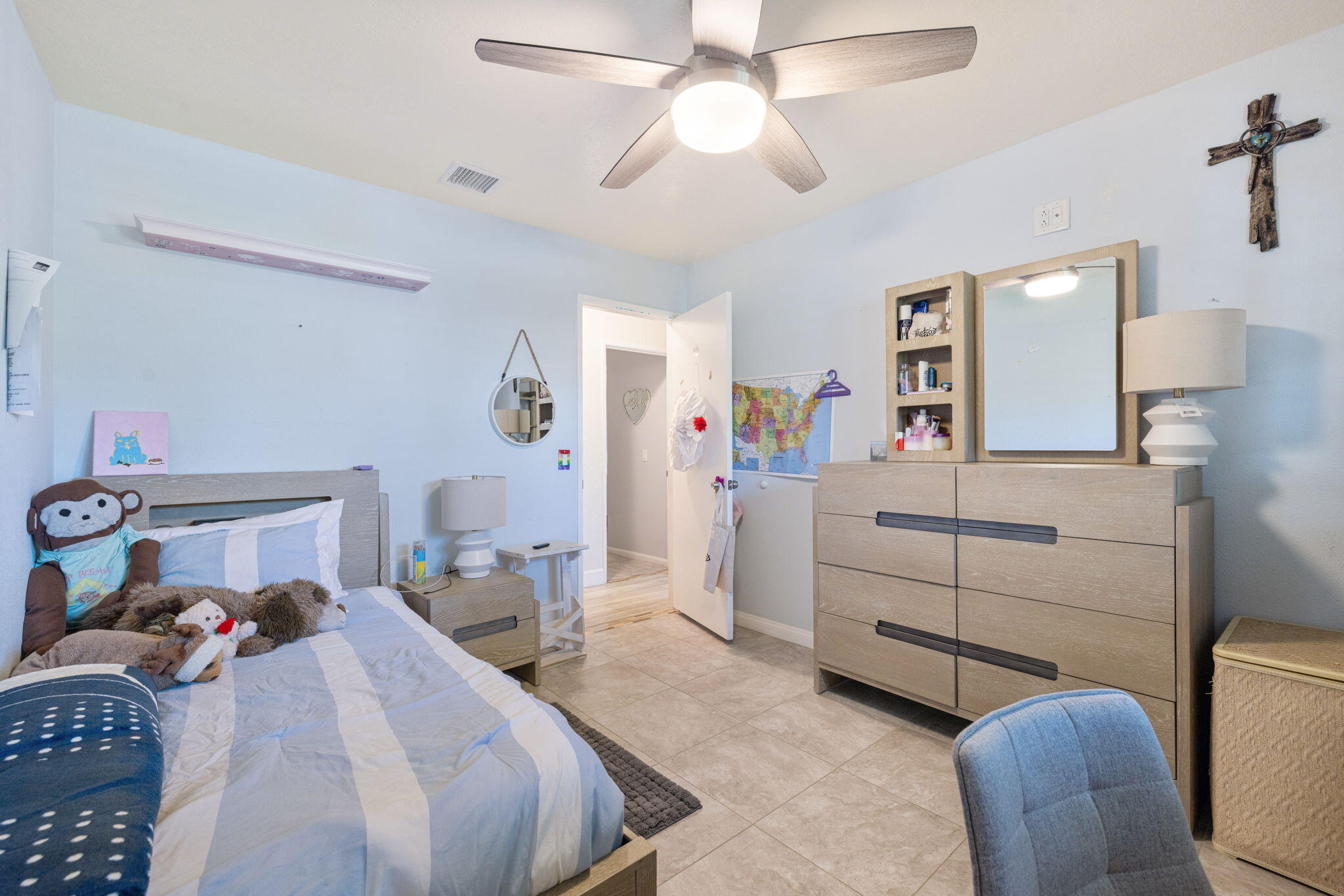 42230 May Pen Road Bermuda Dunes, CA 92203 - Photo 28 of 57 a bedroom with a bed and a chandelier