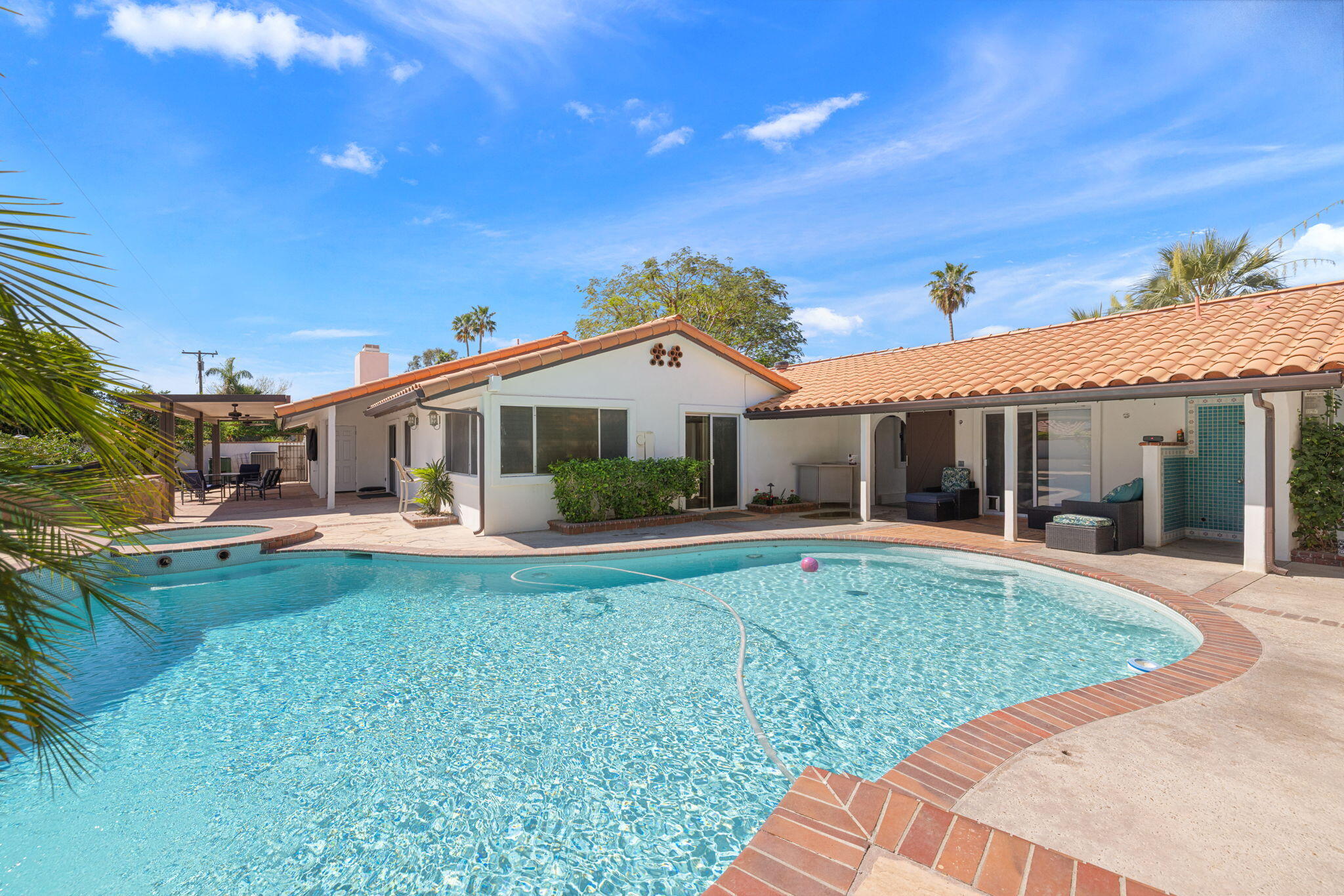 42230 May Pen Road Bermuda Dunes, CA 92203 - Photo 38 of 57 a front view of a house with swimming pool