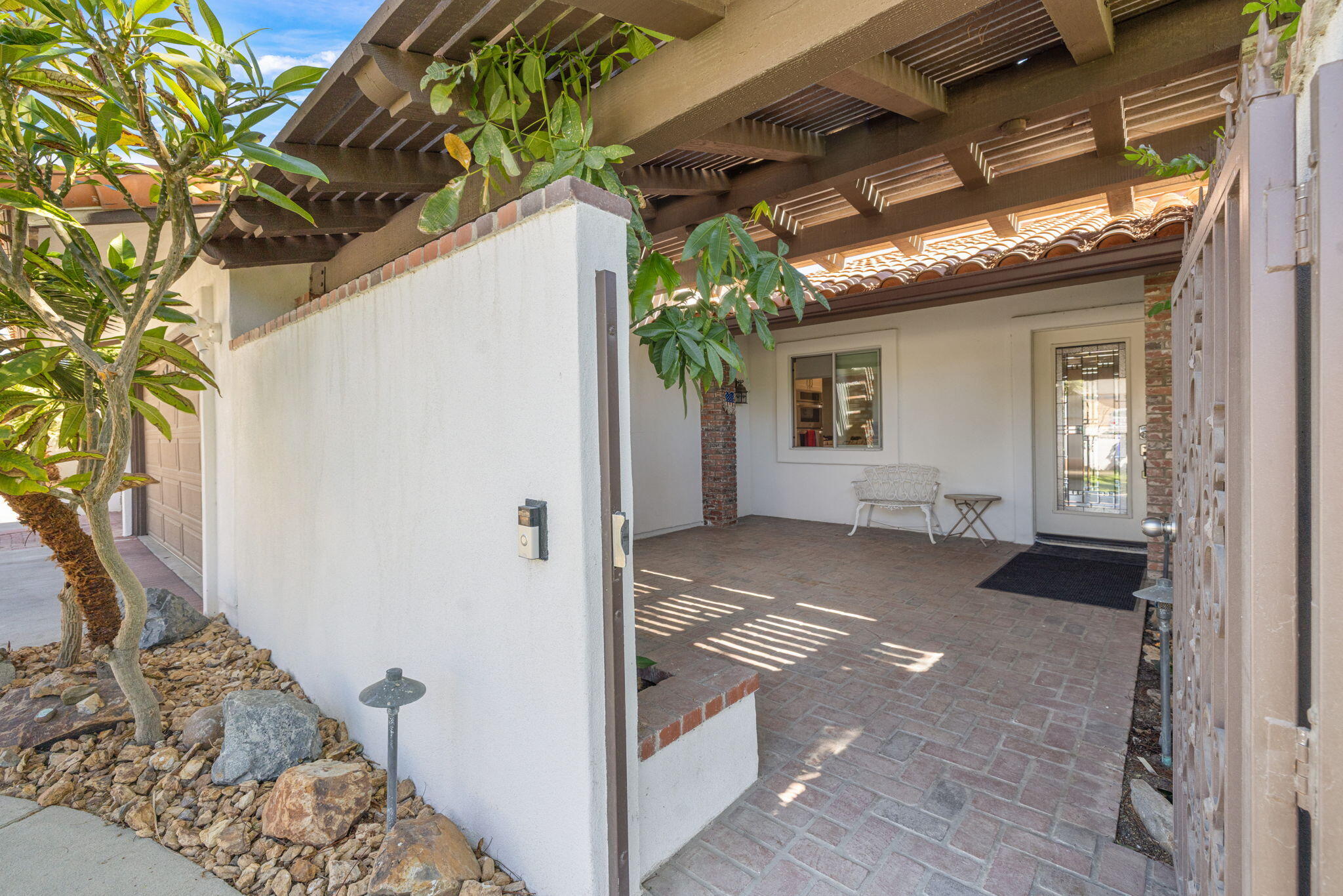 42230 May Pen Road Bermuda Dunes, CA 92203 - Photo 4 of 57 a view of house with backyard and glass windows