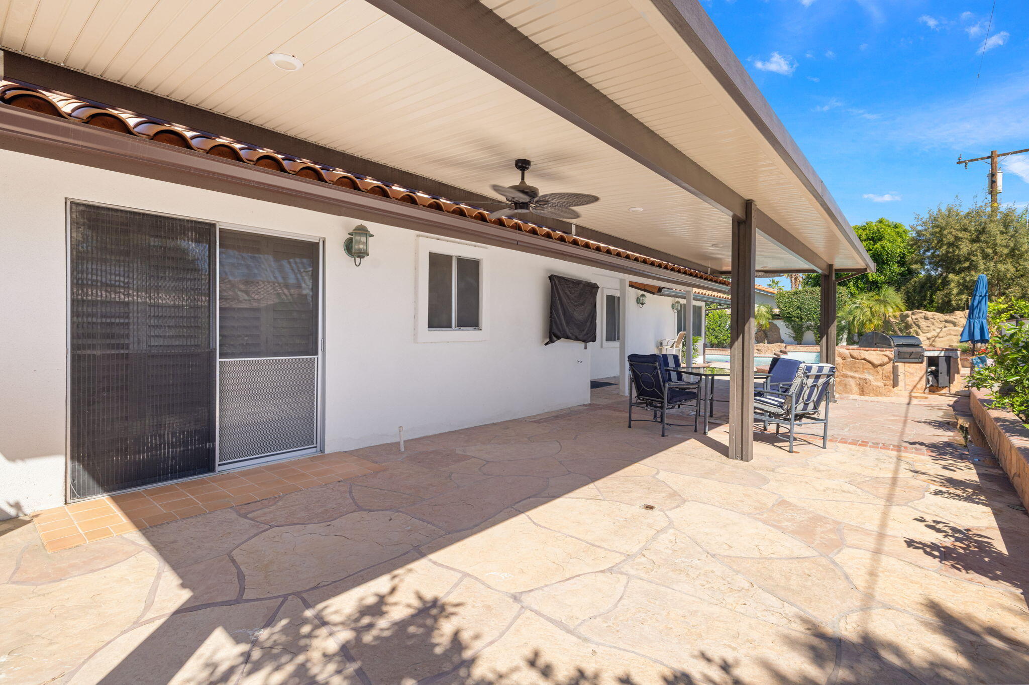 42230 May Pen Road Bermuda Dunes, CA 92203 - Photo 50 of 57 a building outdoor space with patio furniture and potted plants