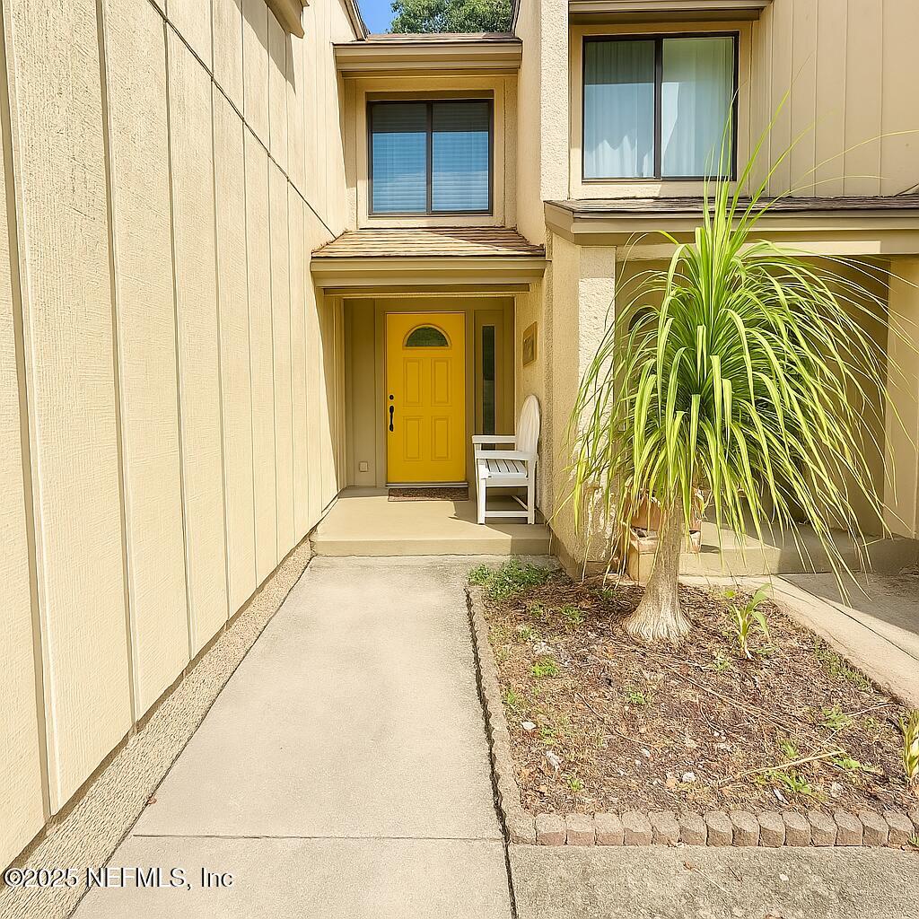 3165 1st Avenue, Unit 13 Fernandina Beach, FL 32034 - Photo 2 of 37 a view of front door of house