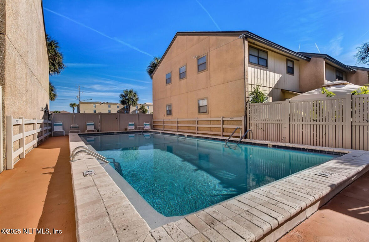 3165 1st Avenue, Unit 13 Fernandina Beach, FL 32034 - Photo 33 of 37 a view of a house with a backyard