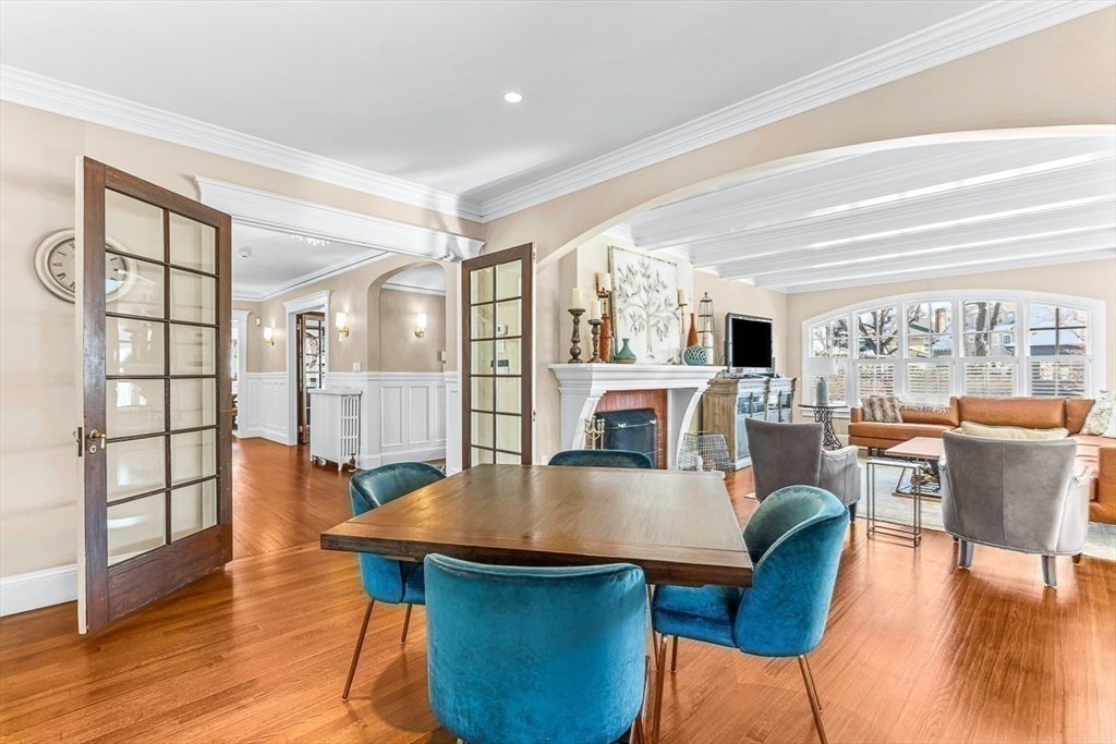 21 Sheffield West Winchester, MA 01890 - Photo 11 of 40 a view of a dining room with furniture and wooden floor