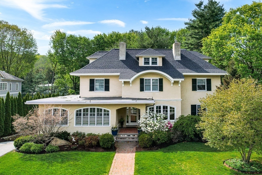 21 Sheffield West Winchester, MA 01890 - Photo 2 of 40 a front view of a house with a yard