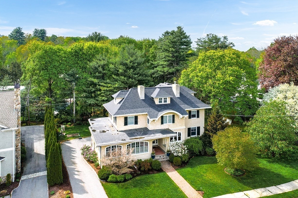 21 Sheffield West Winchester, MA 01890 - Photo 39 of 40 a front view of a house with a yard