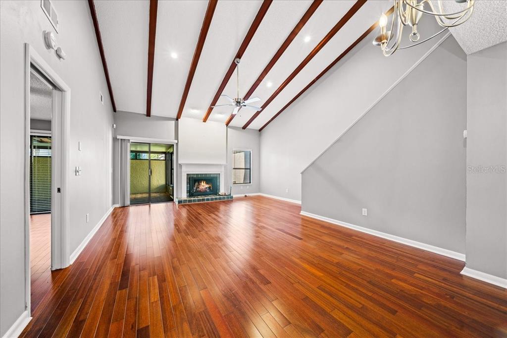 3824 Northeast 19th St Circle Ocala, FL 34470 - Photo 19 of 67 a view of empty room with wooden floor and fan