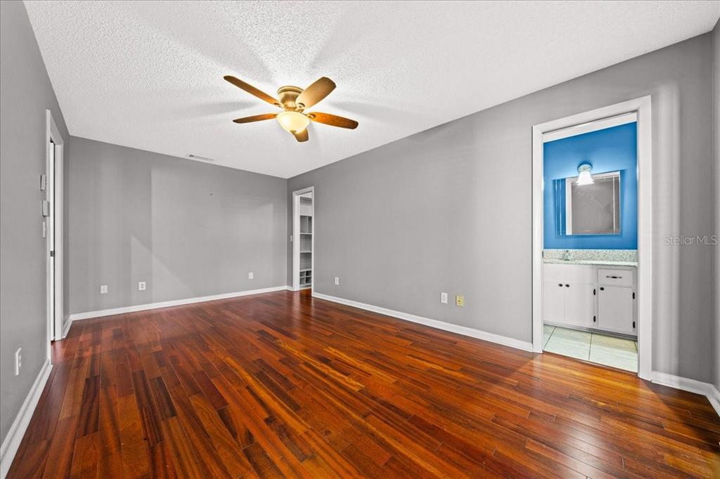 3824 Northeast 19th St Circle Ocala, FL 34470 - Photo 30 of 67 a view of an empty room with wooden floor and a window