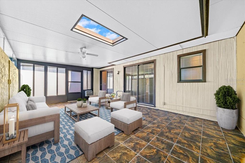 3824 Northeast 19th St Circle Ocala, FL 34470 - Photo 53 of 67 a living room with furniture and wooden floor