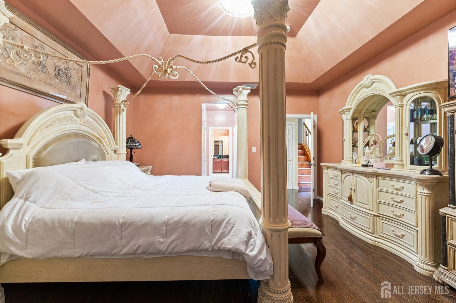 7 Spring Drive Dayton, NJ 08810 - Photo 12 of 24 a bedroom with a bed a dresser and mirror