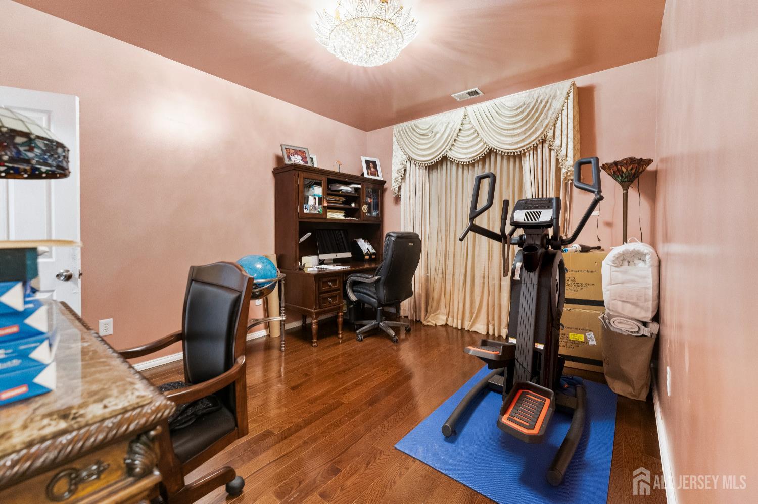 7 Spring Drive Dayton, NJ 08810 - Photo 15 of 24 a view of a room with gym equipment