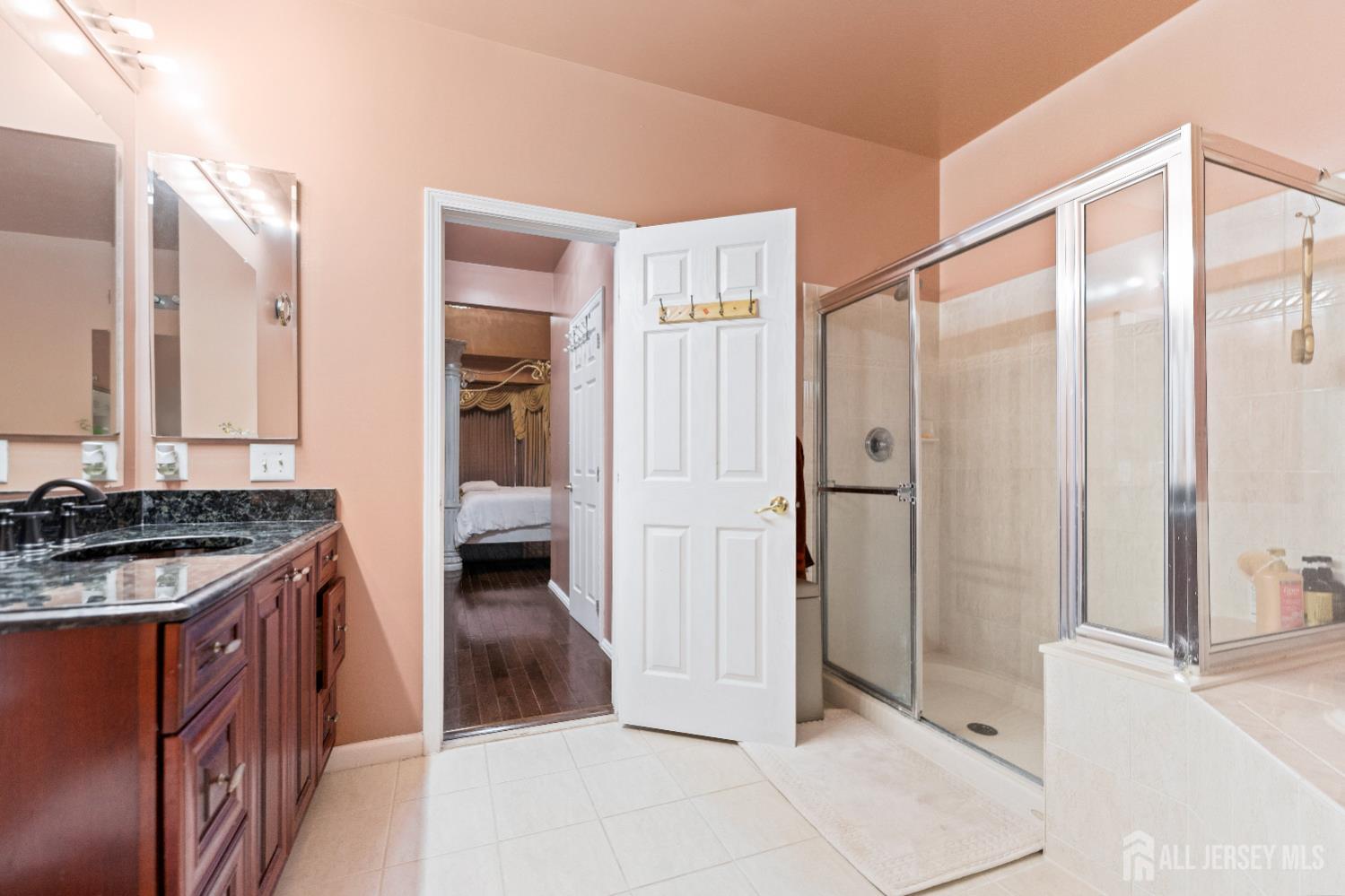 7 Spring Drive Dayton, NJ 08810 - Photo 20 of 24 a kitchen with a stove and a refrigerator