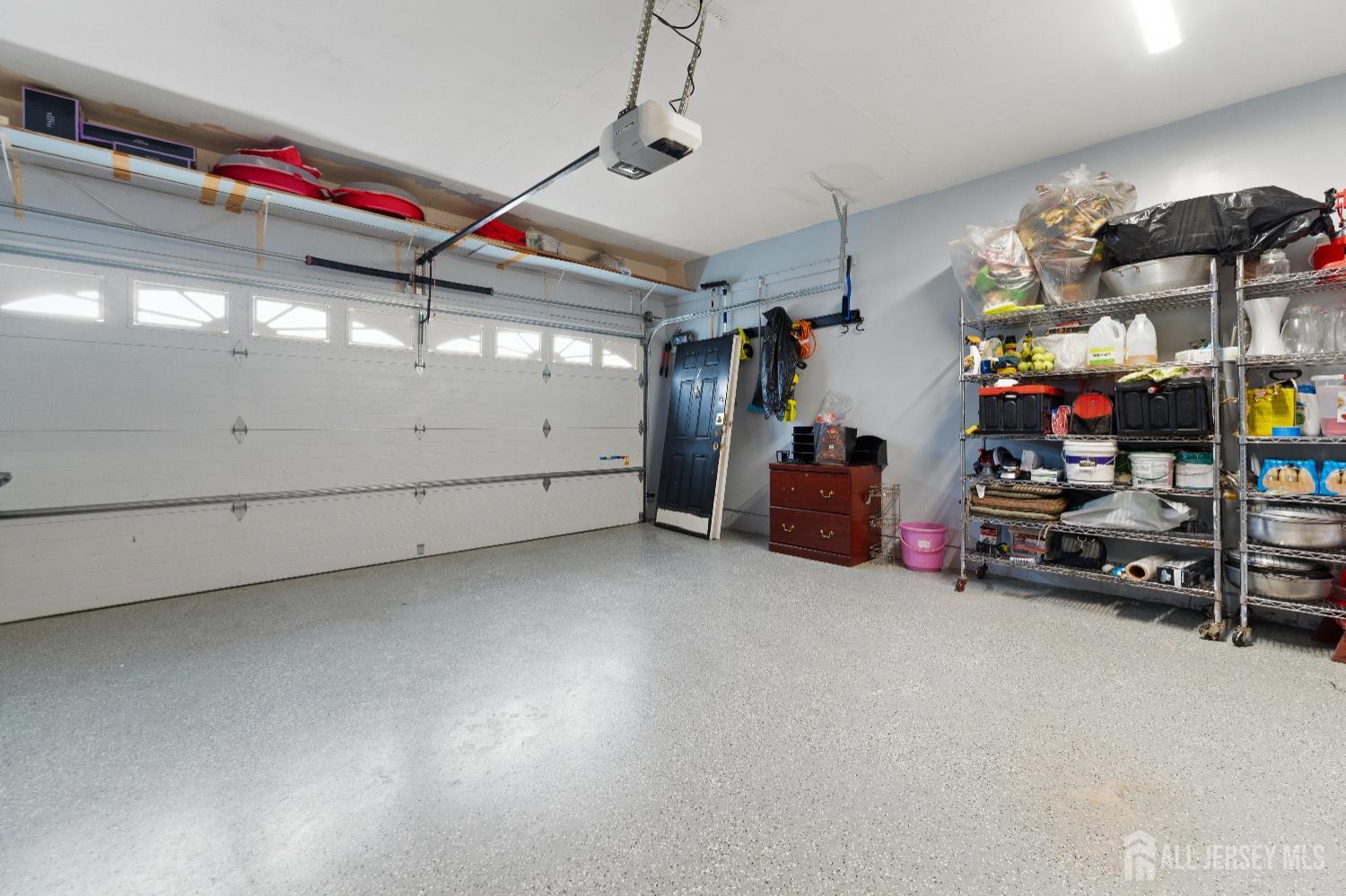7 Spring Drive Dayton, NJ 08810 - Photo 22 of 24 a view of a garage with storage