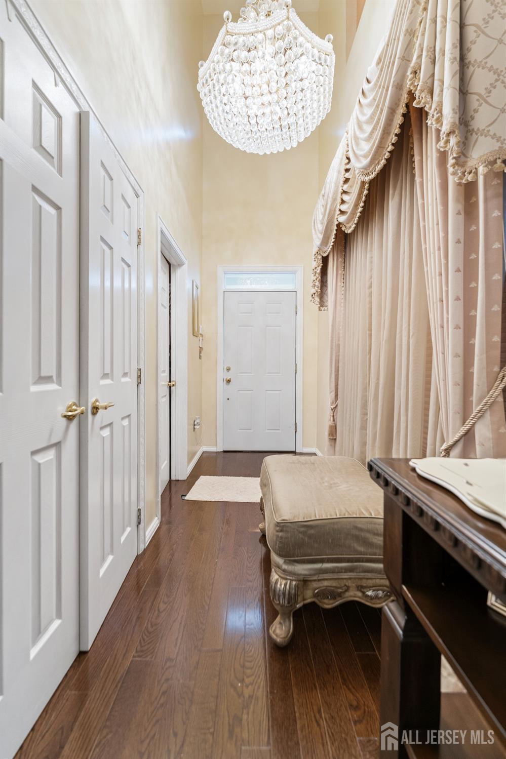 7 Spring Drive Dayton, NJ 08810 - Photo 3 of 24 a bedroom with a bed and wooden floor