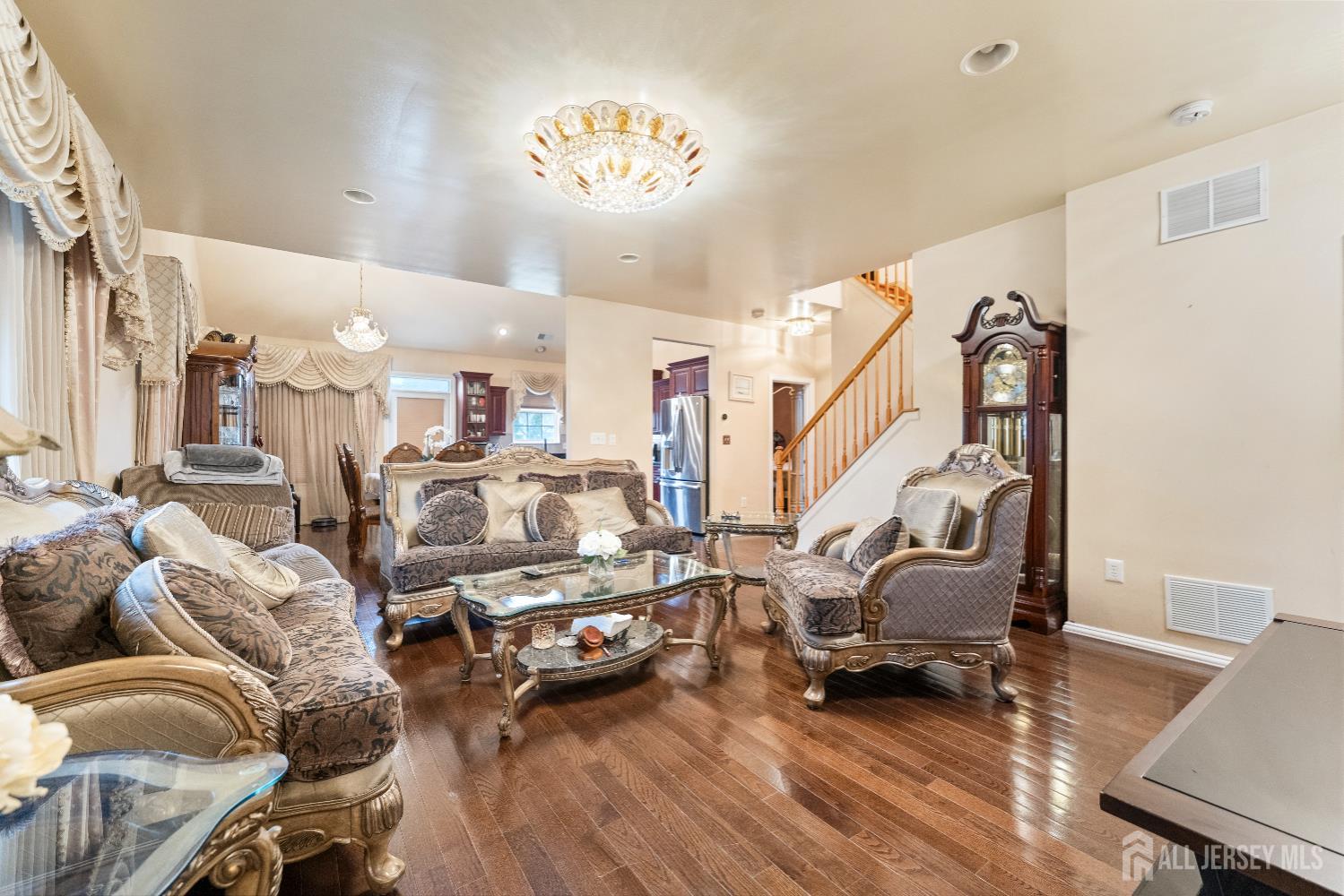 7 Spring Drive Dayton, NJ 08810 - Photo 4 of 24 a view of a livingroom with furniture and a wooden floor