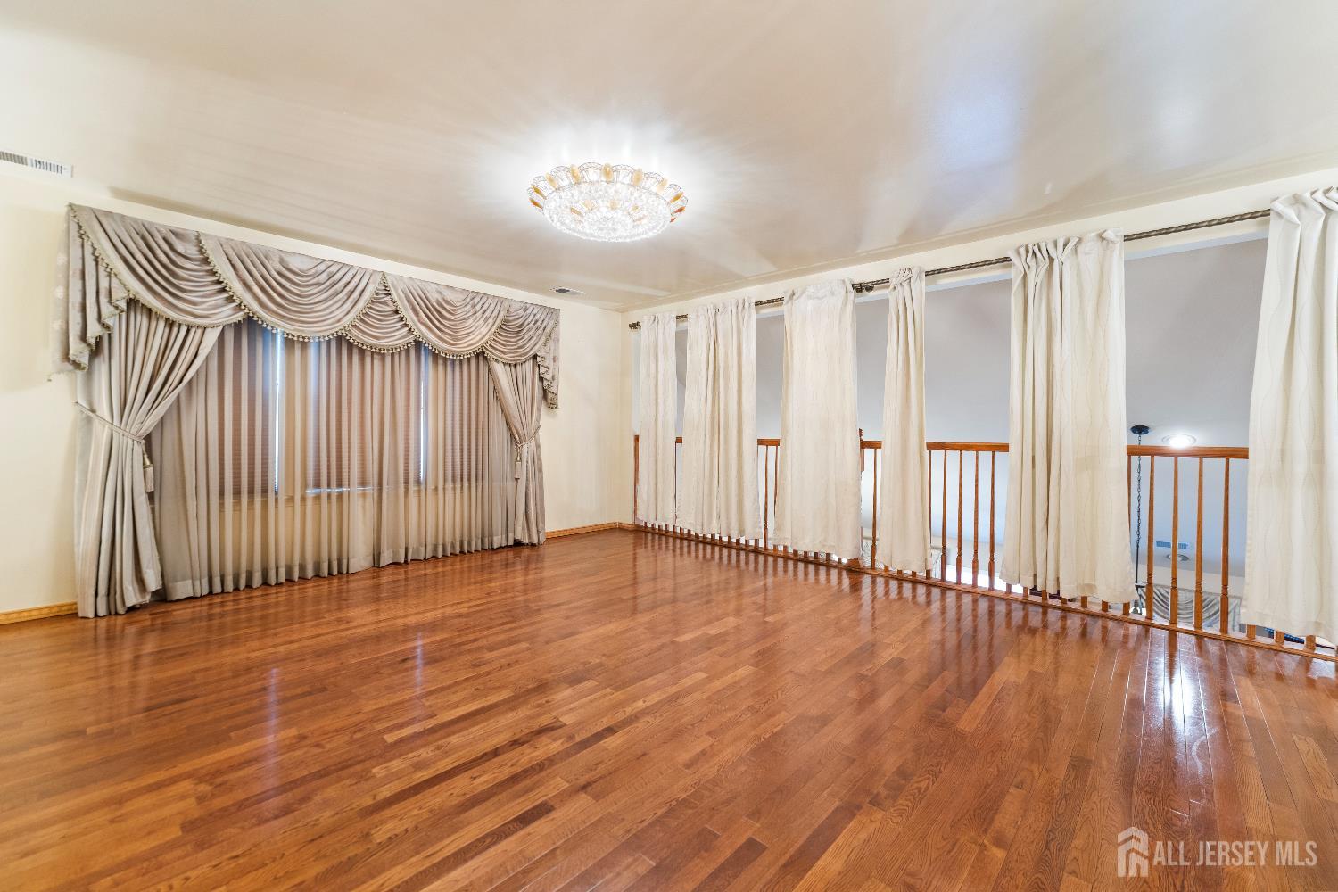 7 Spring Drive Dayton, NJ 08810 - Photo 10 of 24 a view of a room with wooden floor