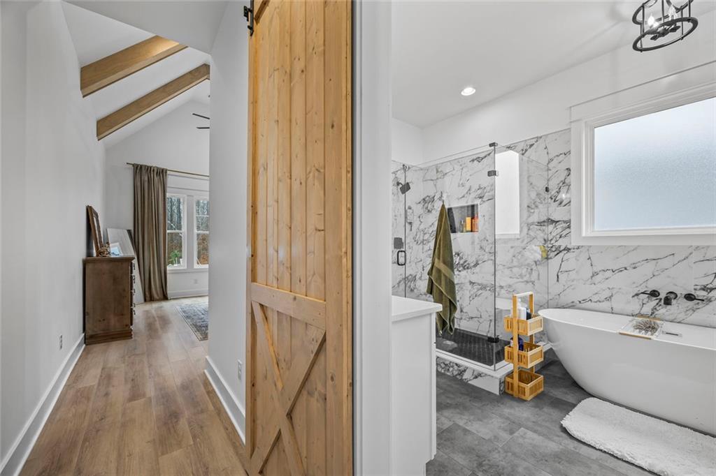 1159 Locklin Road Monroe, GA 30655 - Photo 21 of 63 a bathroom with a sink and a bathtub