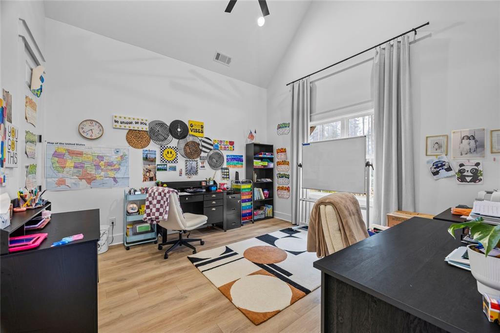 1159 Locklin Road Monroe, GA 30655 - Photo 40 of 63 a work room with furniture and wooden floor