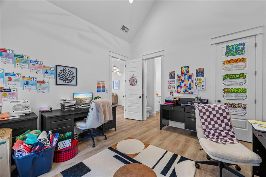 1159 Locklin Road Monroe, GA 30655 - Photo 41 of 63 a living room with furniture and a couch