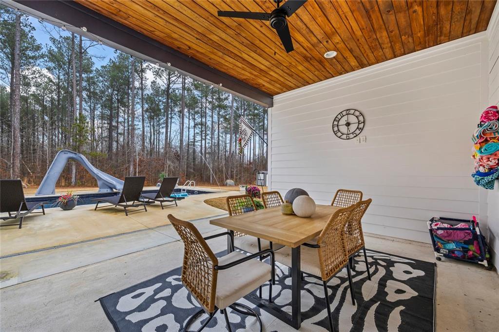 1159 Locklin Road Monroe, GA 30655 - Photo 48 of 63 a view of a chairs and tables in patio
