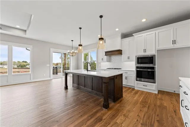 $580,000 | 1132 Southwest Whitby Drive, Lee's Summit, MO 64083