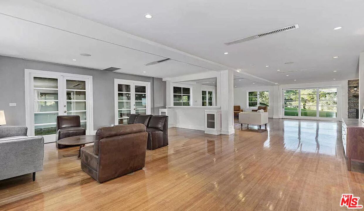 3441 White Rose Way Encino, CA 91436 - Photo 5 of 22 a living room with furniture and wooden floor