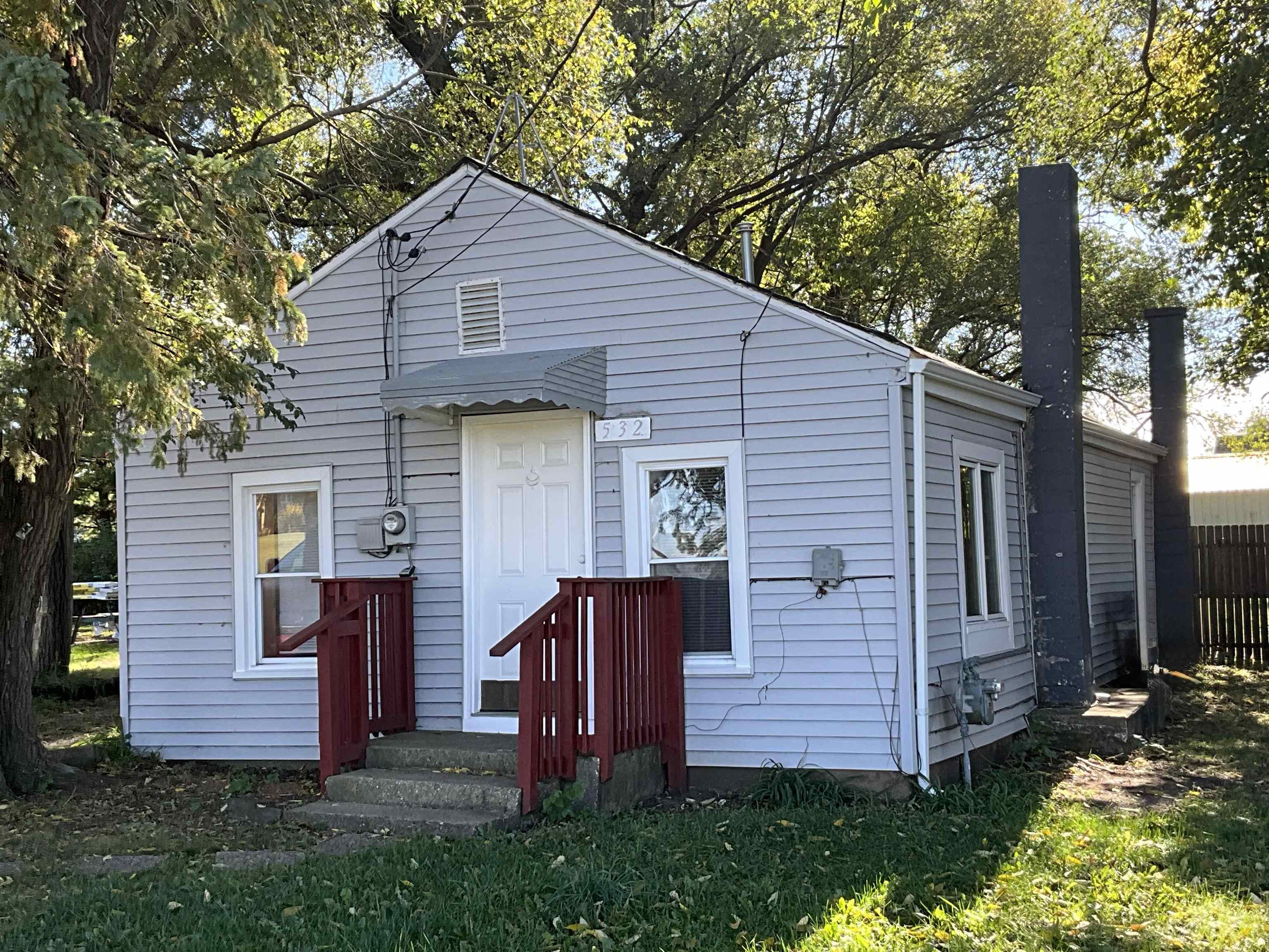 532 Lathrop Terrace South Beloit, IL 61080 - Photo 15 of 17 a front view of a house with garden