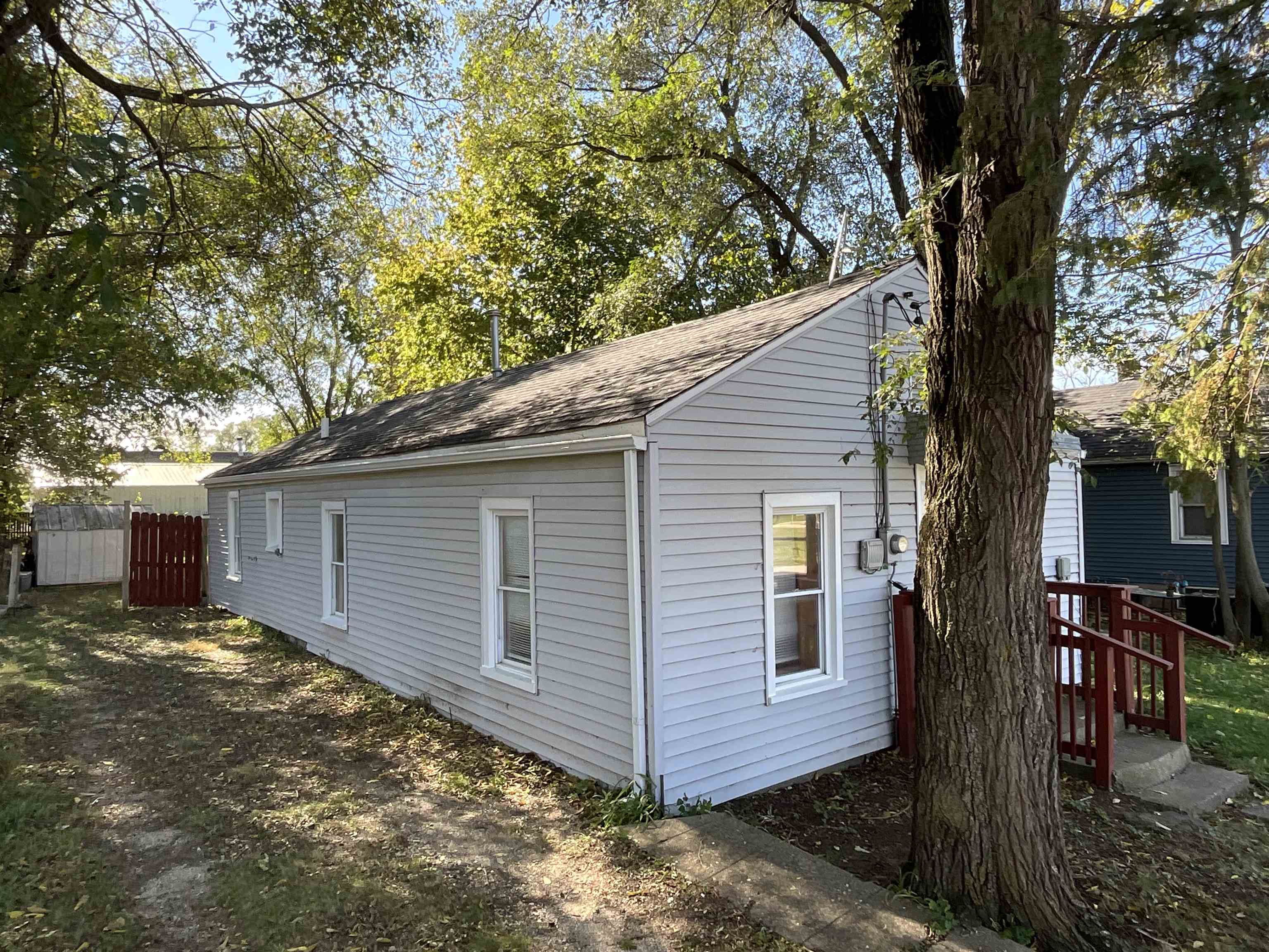 532 Lathrop Terrace South Beloit, IL 61080 - Photo 2 of 17 a view of a house with a yard and large tree