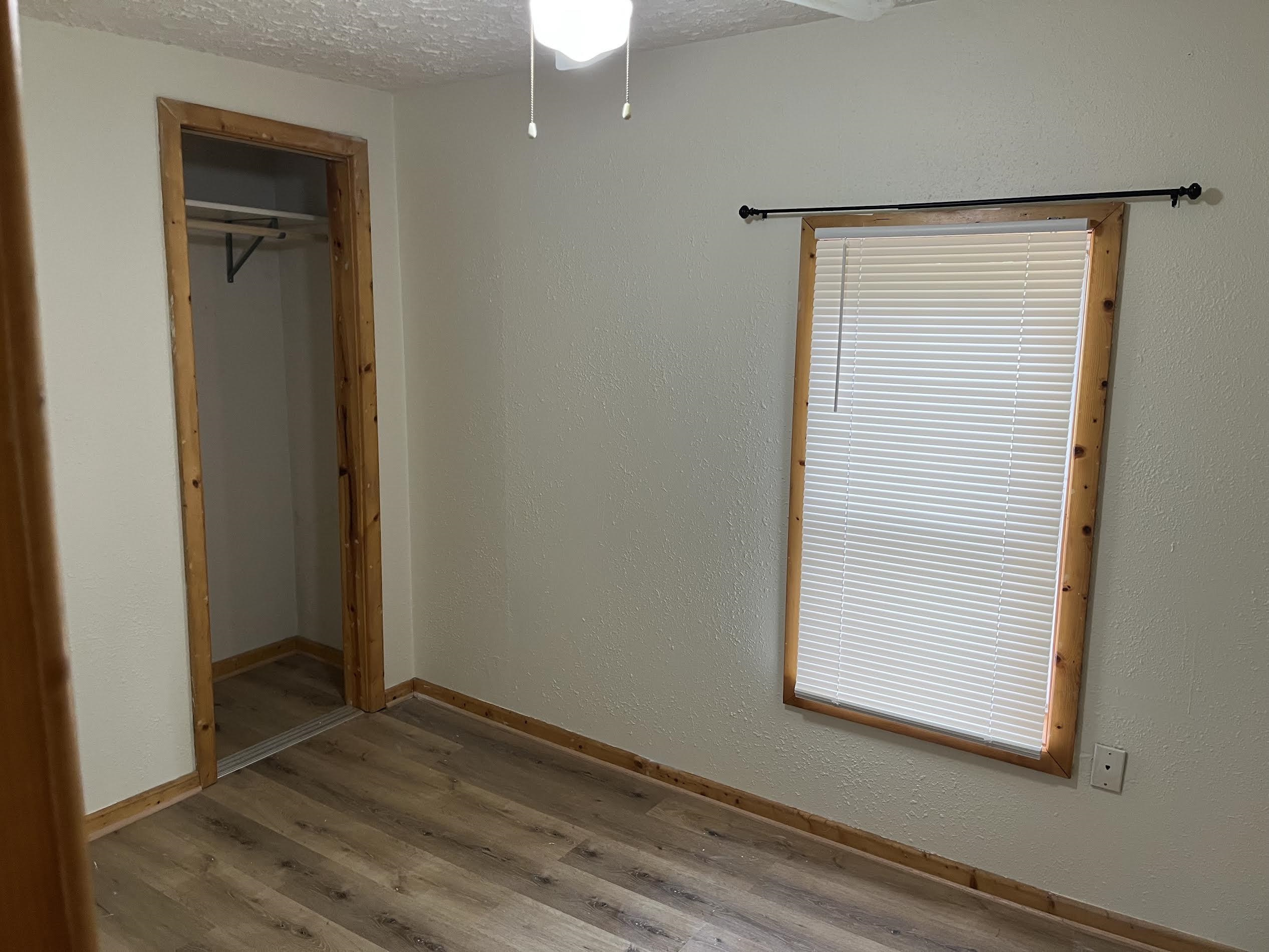 532 Lathrop Terrace South Beloit, IL 61080 - Photo 10 of 17 an empty room with wooden floor closet and windows