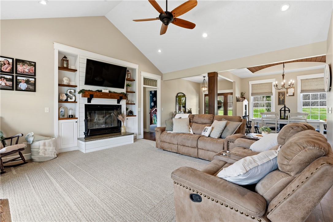 1158 Pyle Road Clarksville, OH 45113 - Photo 74 of 76 This living area features a warm woodburning fireplace and spacious open floorplan.