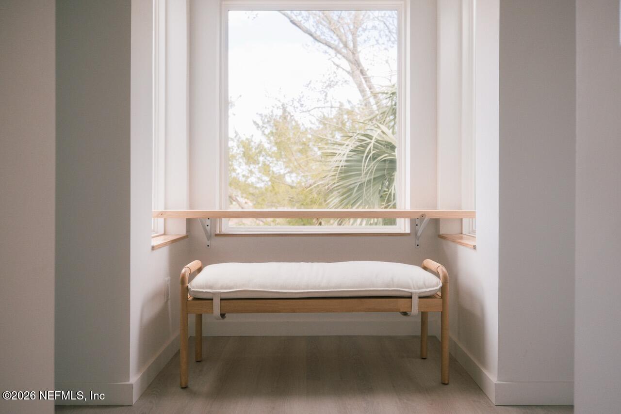 3318 Lewis Speedway St. Augustine, FL 32084 - Photo 12 of 23 a white toilet sitting next to a window