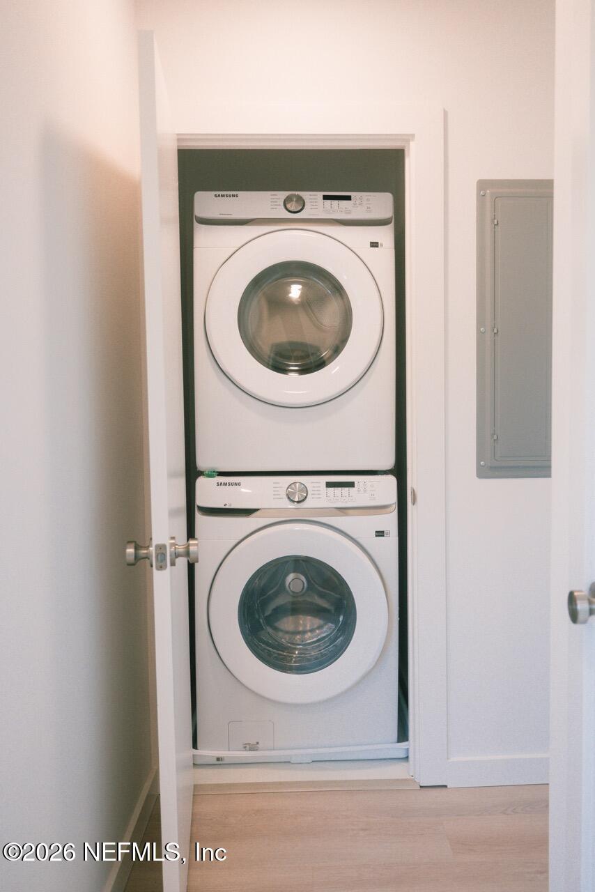 3318 Lewis Speedway St. Augustine, FL 32084 - Photo 13 of 23 a utility room with dryer and washer