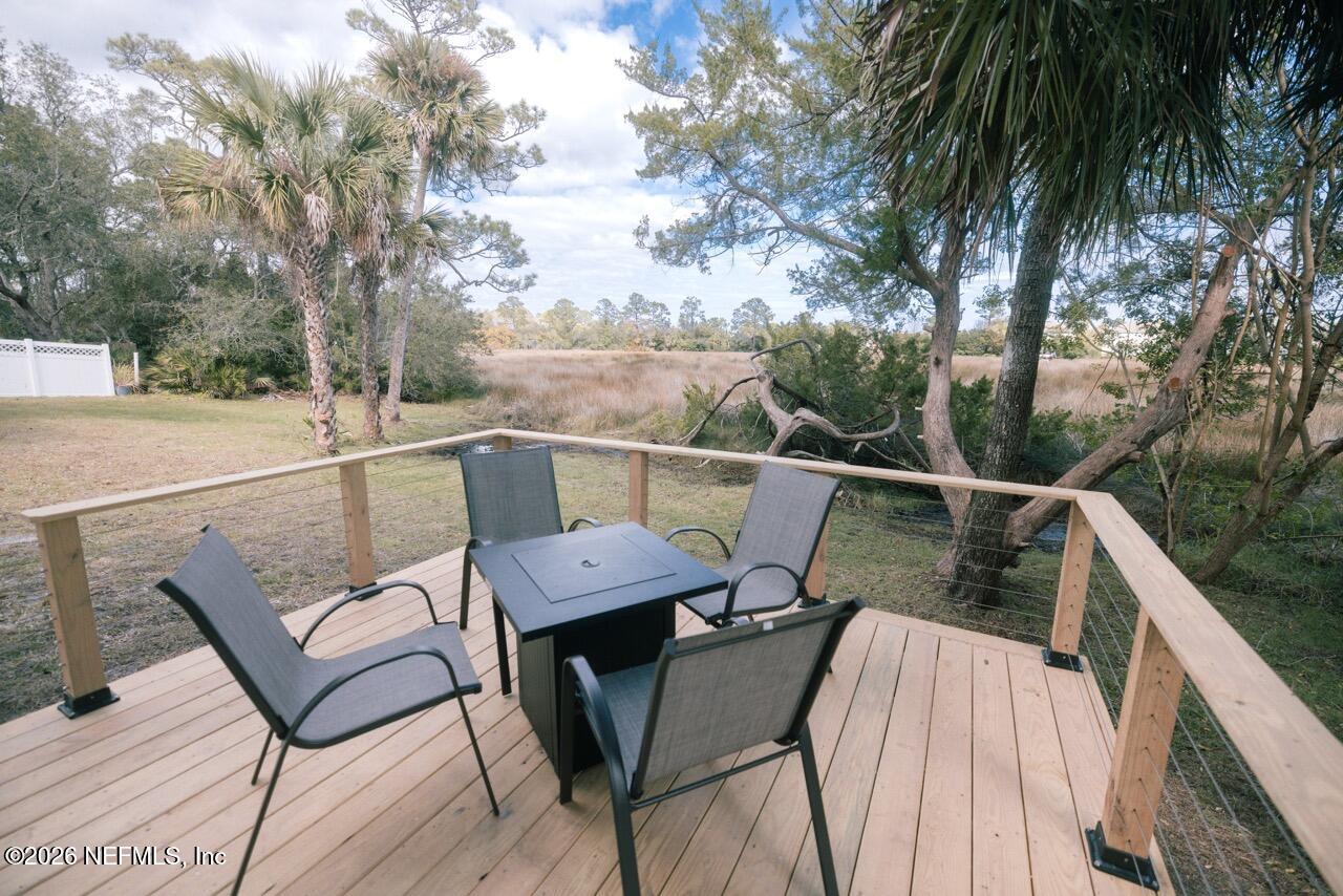 3318 Lewis Speedway St. Augustine, FL 32084 - Photo 19 of 23 a view of a chairs in a balcony