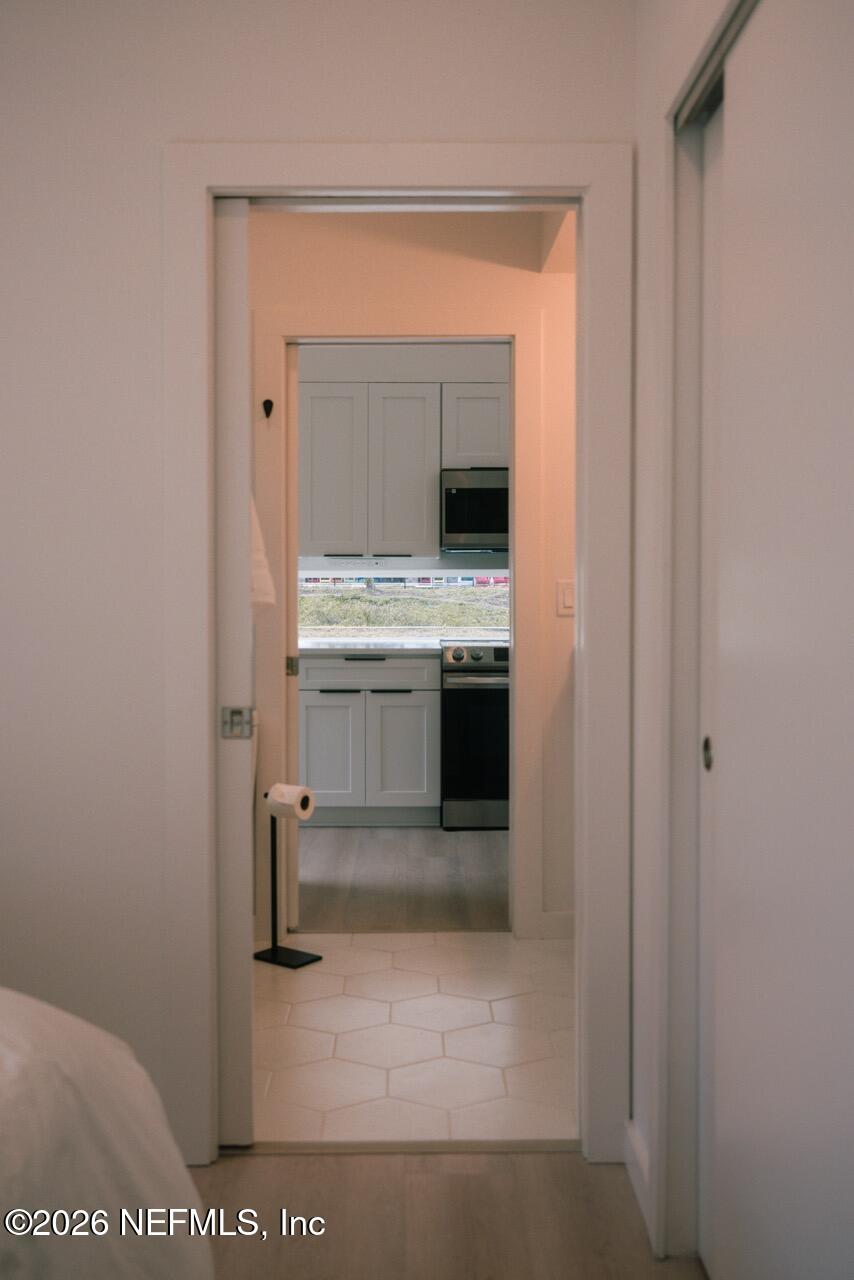 3318 Lewis Speedway St. Augustine, FL 32084 - Photo 9 of 23 a bathroom with a sink and a mirror