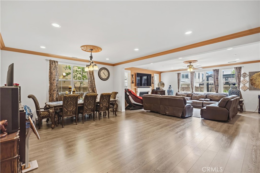 3380 Pine Ridge Loop Ontario, CA 91761 - Photo 6 of 37 a living room with lots of furniture and a large window