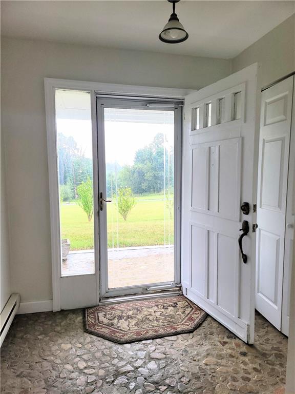 130 Pletcher Road White, PA 15490 - Photo 2 of 22 a view of front door with a ceiling fan