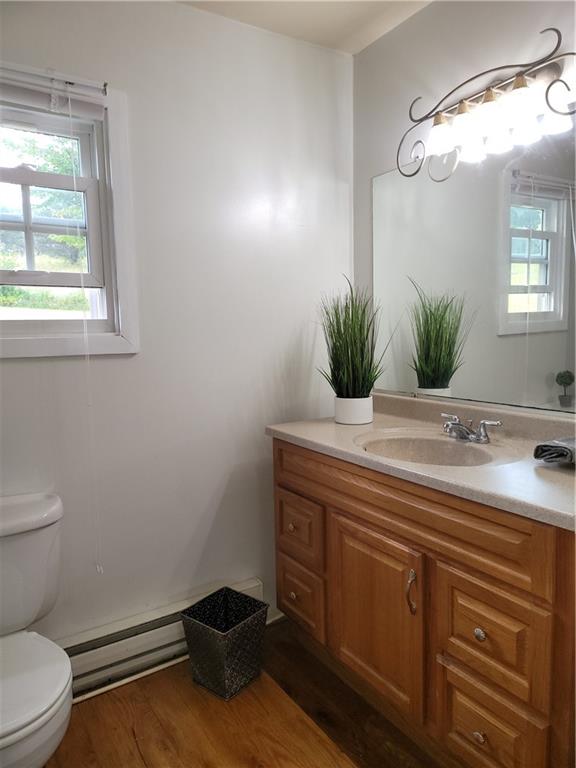 130 Pletcher Road White, PA 15490 - Photo 11 of 22 a bathroom with a sink a toilet and mirror