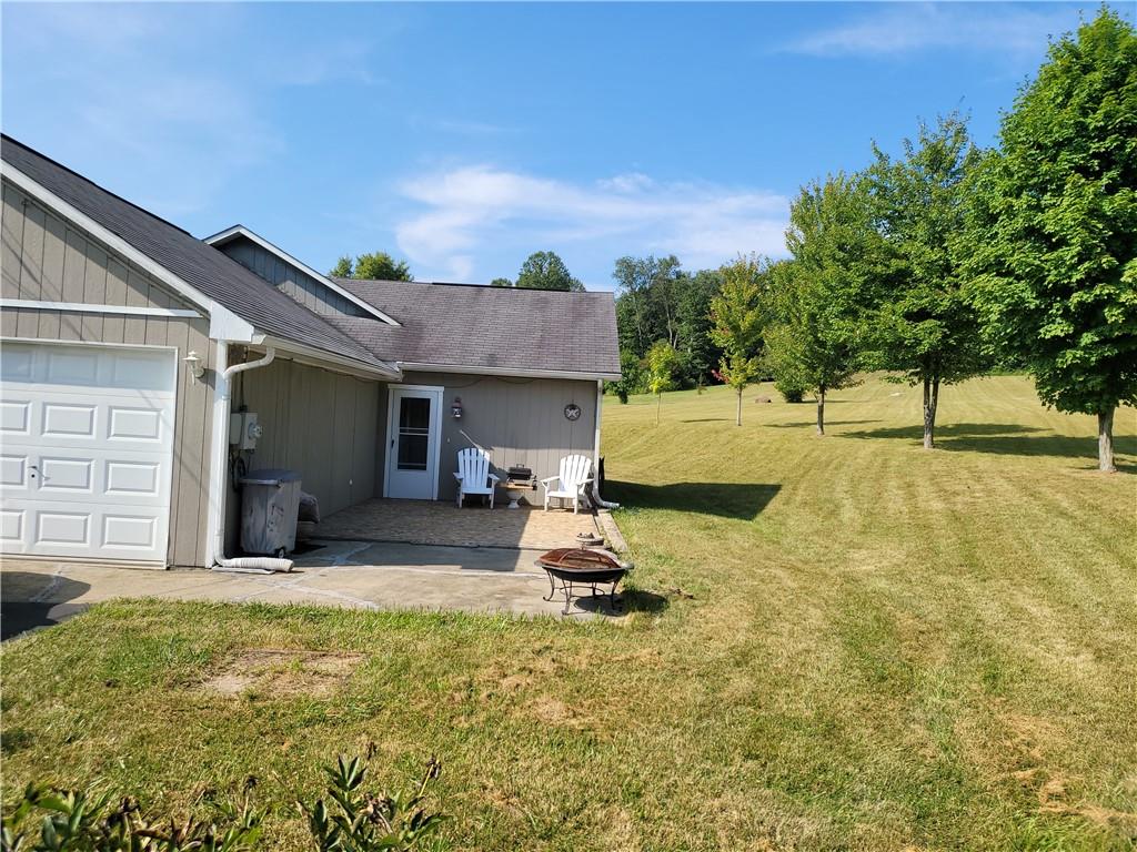 130 Pletcher Road White, PA 15490 - Photo 19 of 22 a house view with a garden space
