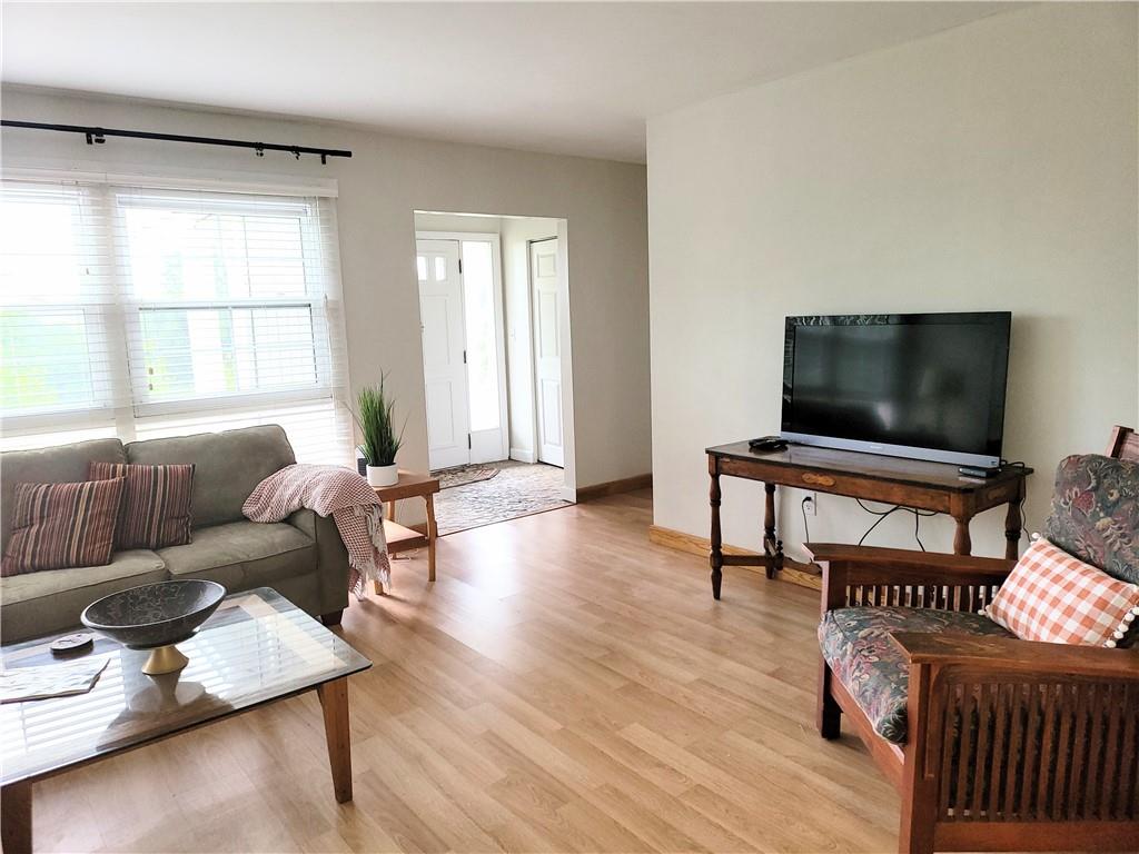 130 Pletcher Road White, PA 15490 - Photo 3 of 22 a living room with furniture and a flat screen tv