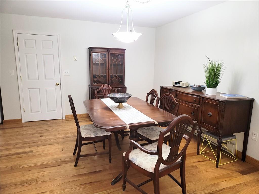 130 Pletcher Road White, PA 15490 - Photo 6 of 22 a view of a dining room with furniture and wooden floor