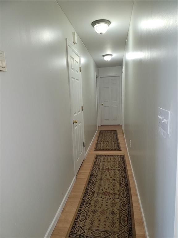 130 Pletcher Road White, PA 15490 - Photo 8 of 22 a view of a hallway with wooden floor
