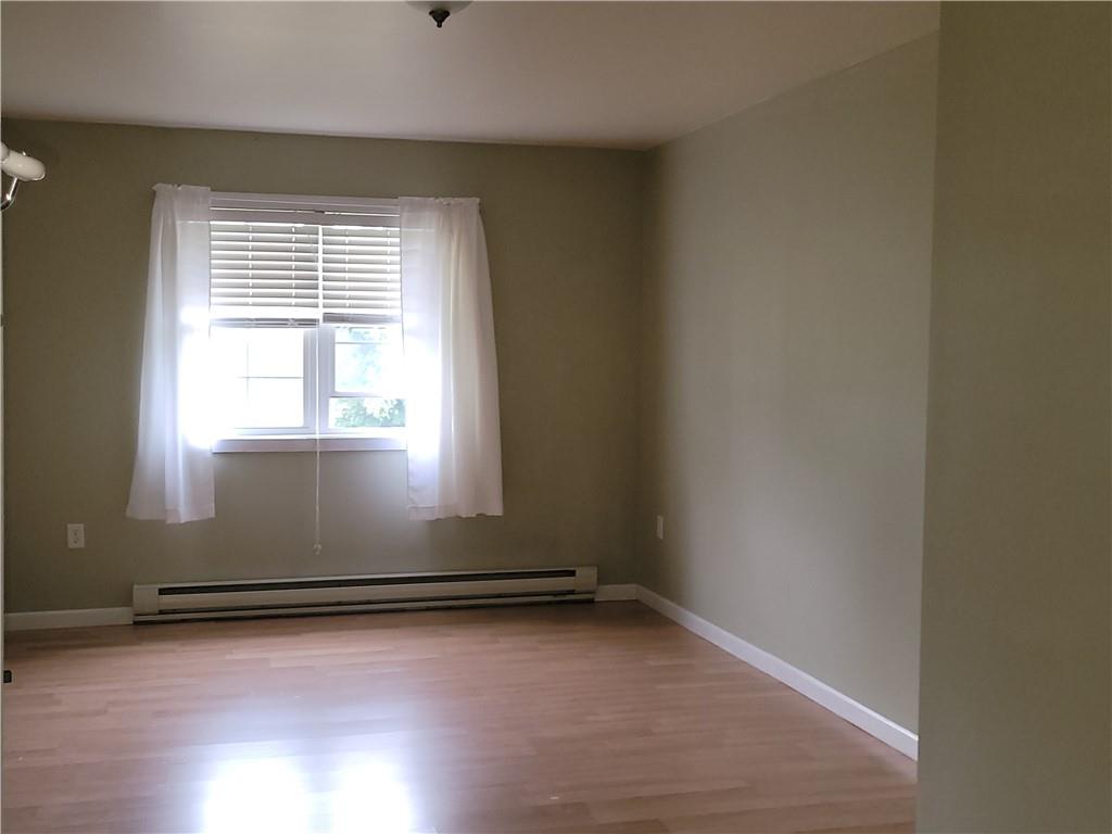 130 Pletcher Road White, PA 15490 - Photo 10 of 22 a view of a room with wooden floor and a window