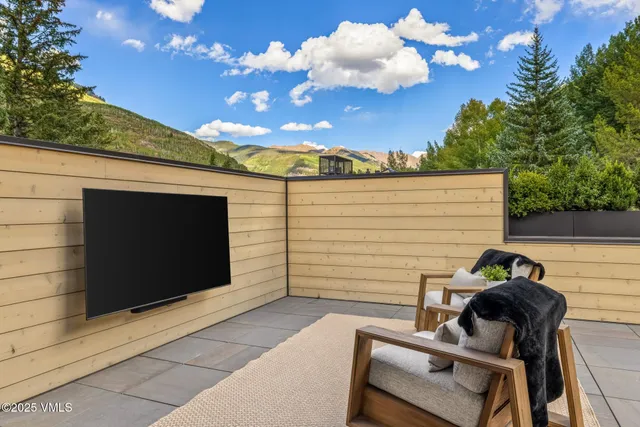 a bathroom with a shower and a window