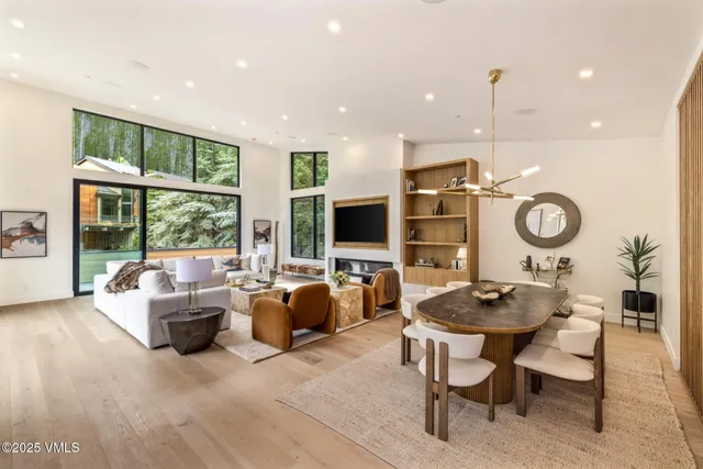 a bathroom with a sink a mirror and a shower