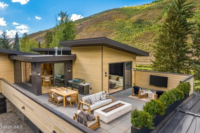 a large kitchen with lots of counter space and windows