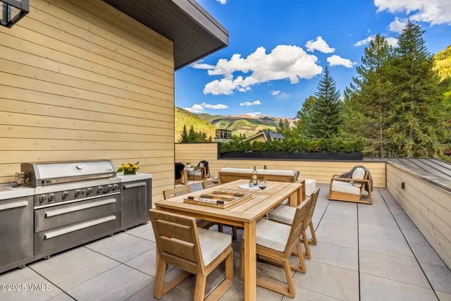 a bathroom with a sink a toilet and bathtub