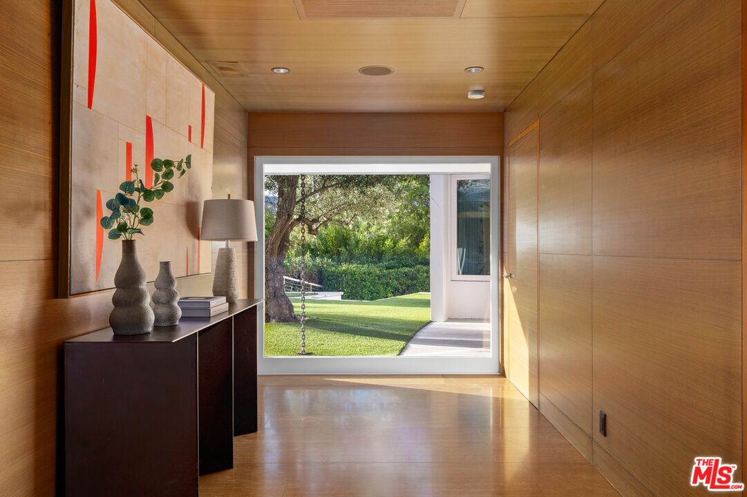 11496 Orum Road Los Angeles, CA 90049 - Photo 17 of 30 a dining room with large window