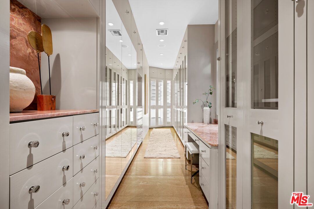 11496 Orum Road Los Angeles, CA 90049 - Photo 23 of 30 a bathroom with a bathtub and a shower