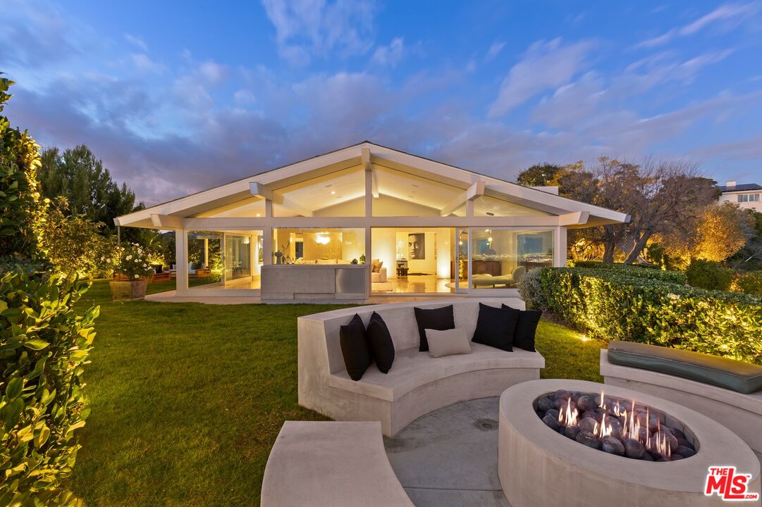 11496 Orum Road Los Angeles, CA 90049 - Photo 30 of 30 a view of outdoor sitting furniture in front of house